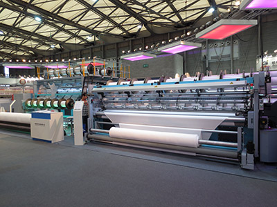 常德纺机新型经编机和摇架加入2014年中国国际纺织机械展览会